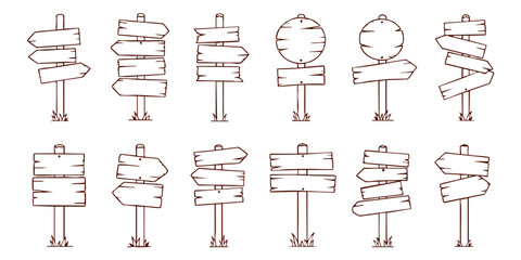 A collection of various directional signs standing upright outdoors. © Dhani