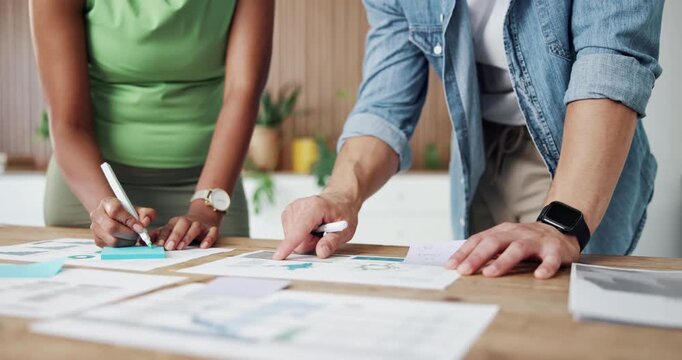 Business people, hands or meeting with documents for planning, strategy or ideas in office. Teamwork, employees or colleagues writing with paperwork, graph or chart for project review in workplace