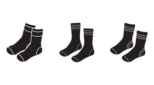 Set of three pairs of black socks with white stripes on white background  foot wear  socks