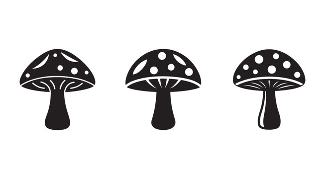 Three black and white mushroom icons with spots on caps and stems isolated on white background