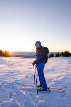 Skier enjoying the mountain sunrise