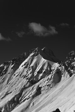 Dramatic black and white view of a rugged alpine peak