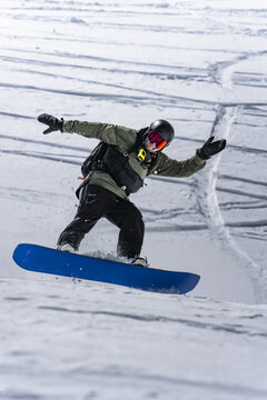 Snowboarder mid-air during a jump