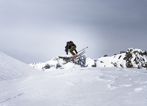 Freeride skier in the mid air