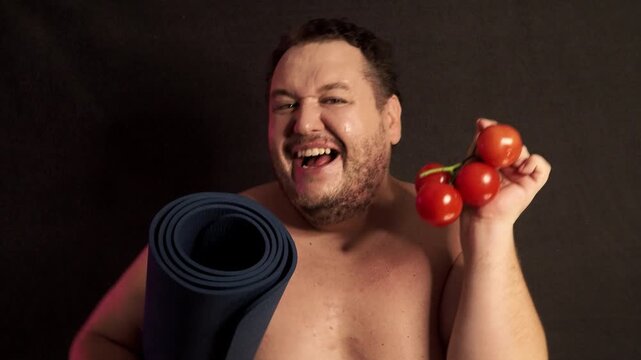 A funny fat man overeats tasty and unhealthy food. Happy guy 