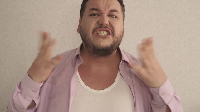 A man swears and argues with his interlocutor