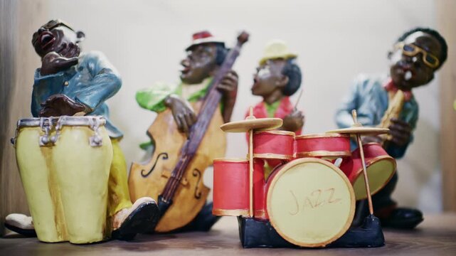Decorative jazz band figurines playing instruments including drums and double bass