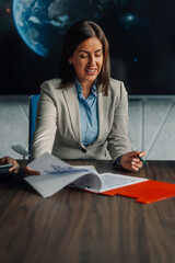 Businesswoman presenting documents during a corporate meeting