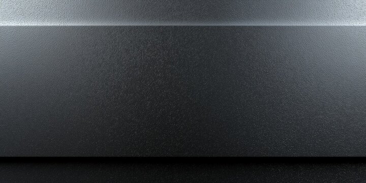 Dunkle texturierte Oberfl&auml;che mit horizontalem Lichtstrahl und dramatischer Beleuchtungswirkung