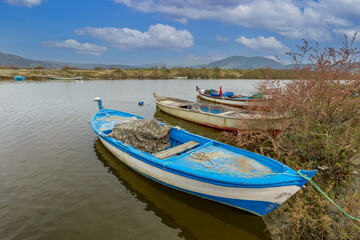 Obraz premium Türkiye - Aydın - Serçin village, the Menderes River, fishing boats of various colors in the canal.