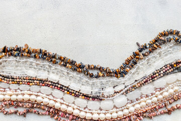 Lots of gemstones and pearls beads for jewelry, top view