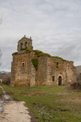 Obraz premium Ruins of San Miguel church with abandoned stone bell tower in the rural landscape of Soria, Spain
