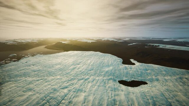Aerial glacier wilderness under soft light portraying solitude and quiet horizon expansive ice fields, scattered floes and gentle sky create meditative mood
