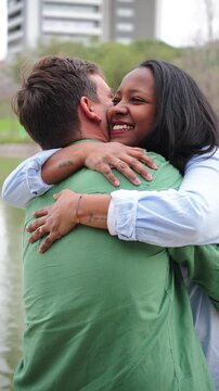 A heartwarming moment of connection as two individuals share a joyful embrace, expressing love and affection in a delightful way, demonstrating the beauty of human interaction and emotional bonds.