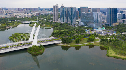 Zhengzhou Longzi Lake District - Modern Bridge and City Skyline © PhanThi