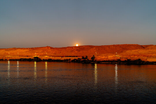 Moonrise Above Desert Nile Landscape in Aswan Egypt