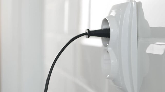 Plug in Electrical Cord in Socket, Plugging Devices, Electric Power View, Save Cost in Energy Industry Crisis