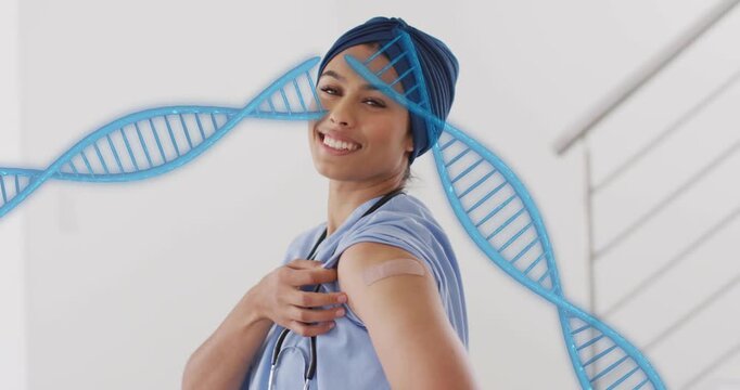 Vertical video: Nurse pulling sleeve, showing bandage, pointing through DNA helix promoting vaccine