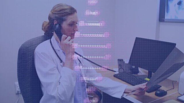 Vertical video: Doctor lifting handset, reading paper and checking records, DNA sweeping foreground