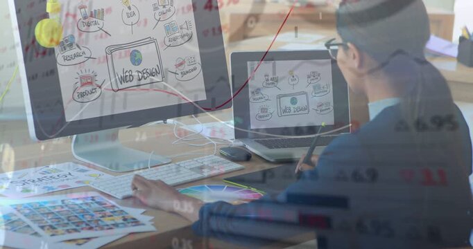 Designer holding stylus, refining web UI while analytics and red trend floating on screens