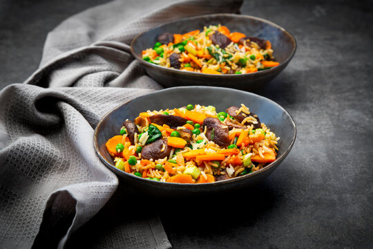 Vegetarian fried rice with shiitake mushroom carrot pea and spring onion