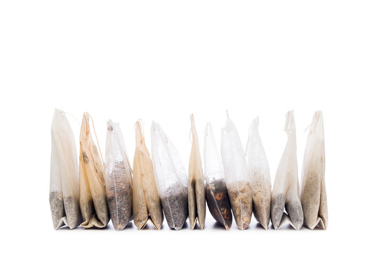 Filter tea bags variety isolated on white background.