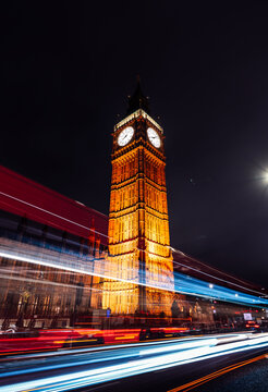 Big Ben illuminated at night with light trails in London