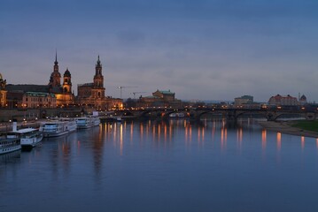 Fototapeta premium Dresden panorama of Altstadt with Frauenkirche and Augustus Bridge at dusk