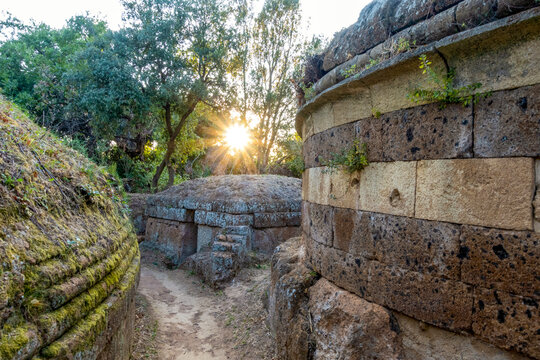 Etruscan tombs and burial mounds in the Necropolis of Cerveteri at sunset