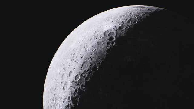 A stunning view of the crescent moon reveals intricate details of its surface, including craters and shadows, set against the deep blackness of space at night.