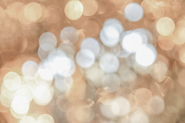Fototapeta premium Cool toned bokeh lights with soft blur and scattered highlights forming an abstract lighting pattern that creates a calm winter mood for seasonal design use.