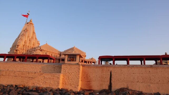 famous somnath temple architecture glowing in evening sunlight near arabian sea shot is taken at Somnath, Gujarat india.