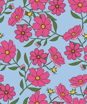 Seamless floral pattern featuring vibrant pink cosmos flowers and green leaves on a soft blue background. 