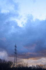 Evening Sky with Power Lines and Dramatic Clouds