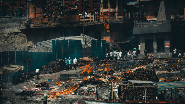 Manikarnika Ghat Cremation Rituals with Burning Pyres and Sacred Traditions on the Banks of the Ganges River in Varanasi, India