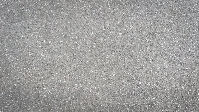 Close-up View of Gray Asphalt Road Texture, an Urban Street Surface Background. Ashpalt Texture