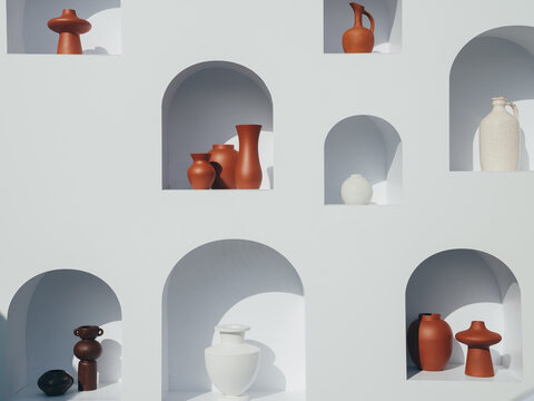 White and brown clay jugs arranged horizontally on shelves on a white decorative wall. Graphic minimalism and shadows.