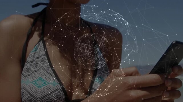 Beach user tapping smartphone and guiding glowing network globe into stable 3D sphere for tech demo