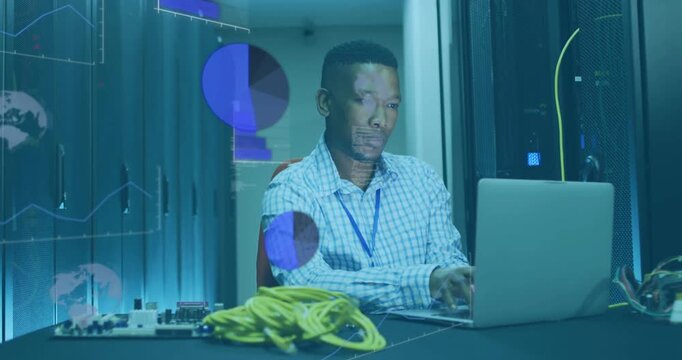 IT specialist powering laptop in server room and analysing live data visuals while tuning settings