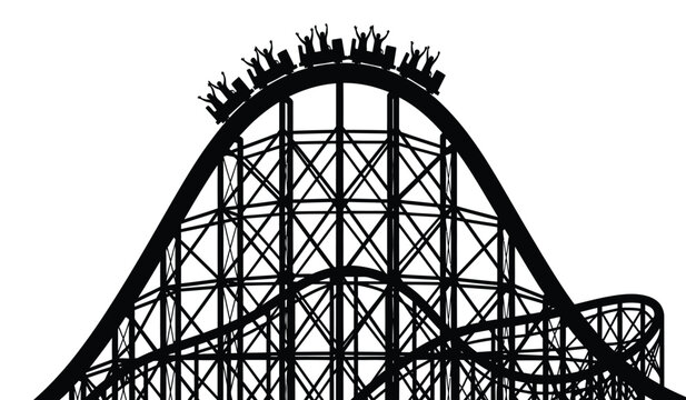 Silhouette of a roller coaster with riders at the top of a steep hill