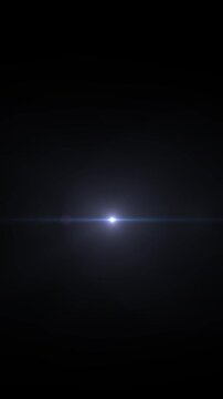 Vertical seamless loop of a bright blue anamorphic lens flare pulsing on a black background for cinematic overlays