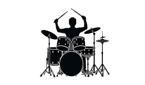 Silhouette of a drummer playing a drum set with sticks
