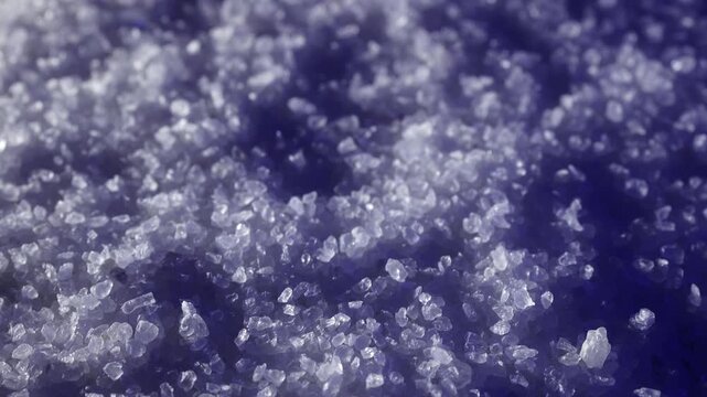 Floating salt. Epsom salt. Salt. Blue light. slow motion video. High quality 4k footage