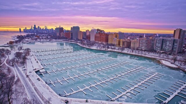 Drone shot revealing downtown Chicago&rsquo;s Loop at the start of a winter day.