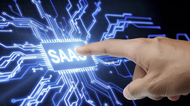 Hand touching a circuit board with the word SAAS in bold letters, symbolizing technology and software services.