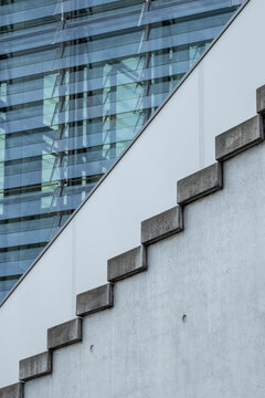 Abstract architecture facade with modern staircase at bold angle showing geometric lines contrast glass and detail for contemporary city design