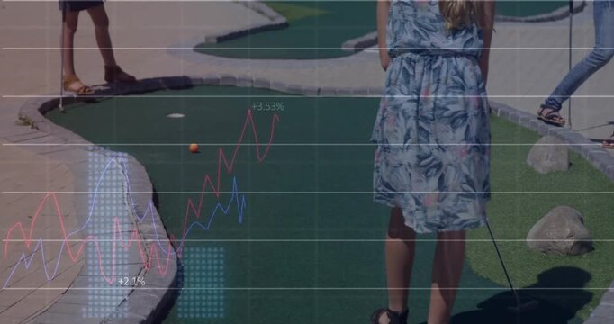 Girls practicing mini golf, with animated score icons showcasing trajectory for sports marketing