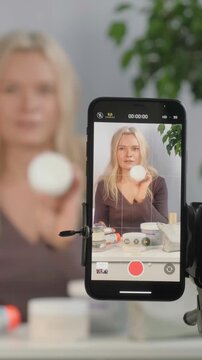 Woman Highlights Skincare Benefits. Skincare Qualities Presented By Woman Within Natural Environment Scenes. Woman Highlights Advantages And Textures Of Skincare Items In Natural Surroundings