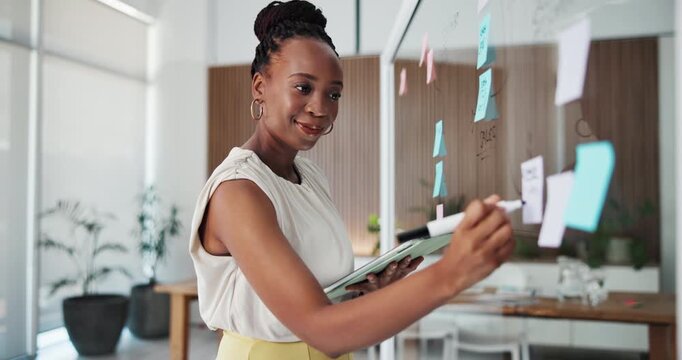 Glass wall, tablet and black woman in office with research, ideas or information for creative project. Board, technology and magazine editor planning for article with publishing in startup agency.