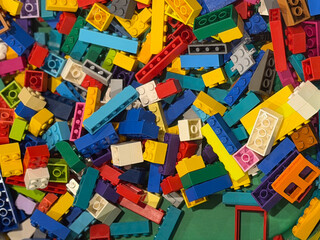 Fototapeta premium Multicolor plastic building bricks pile